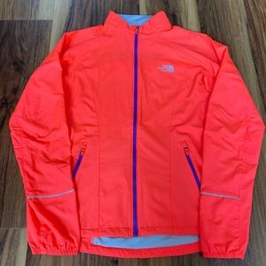 the north face neon orange windbreaker jacket